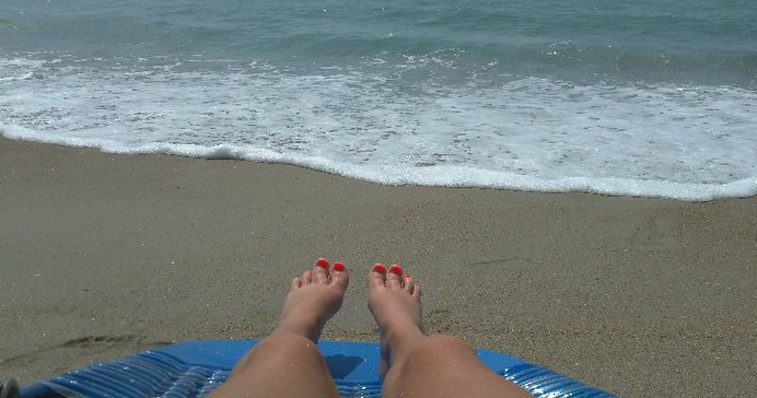 Flip Flop Feet On The Beach