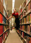 Red Shirt in the Library by FloatingDriftwood