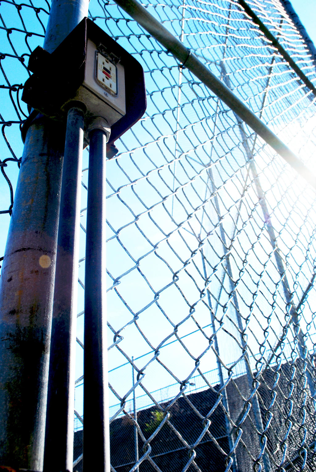 Outlet, Fence and Sun