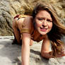 Supergirl forced into Slave leia outfit.