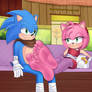 Amy relaxing her feet on Sonic