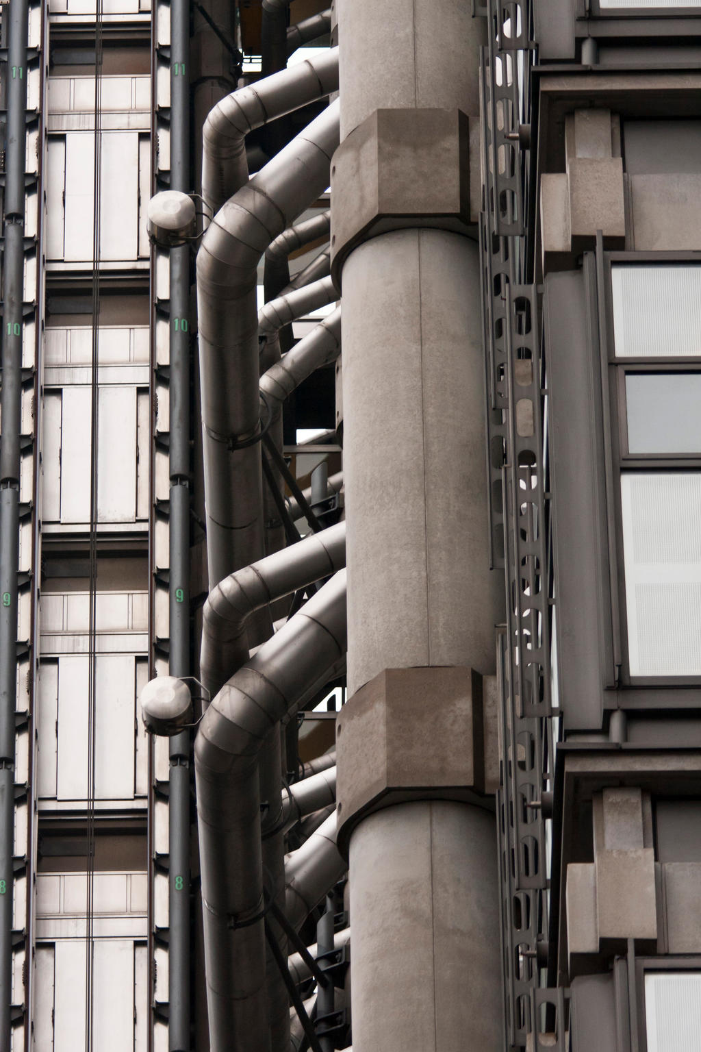 External elevator shaft and pipes