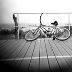 bike on a boardwalk by cedmundmiller