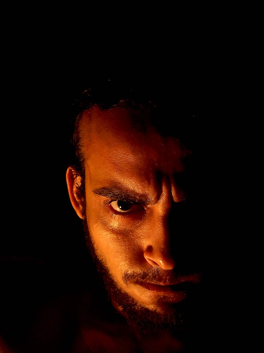 angry face in the dark