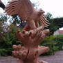 Woodcarver Eagle with salmon in progress 16