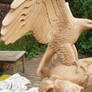 Woodcarver Eagle with salmon in progress 18