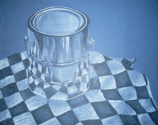 paint can on checkered fabric