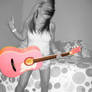 Meg and her pink guitar