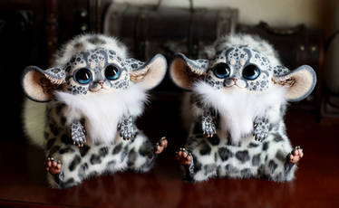 Inari Foxes: Snow Leopard