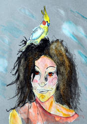 Woman and parakeet