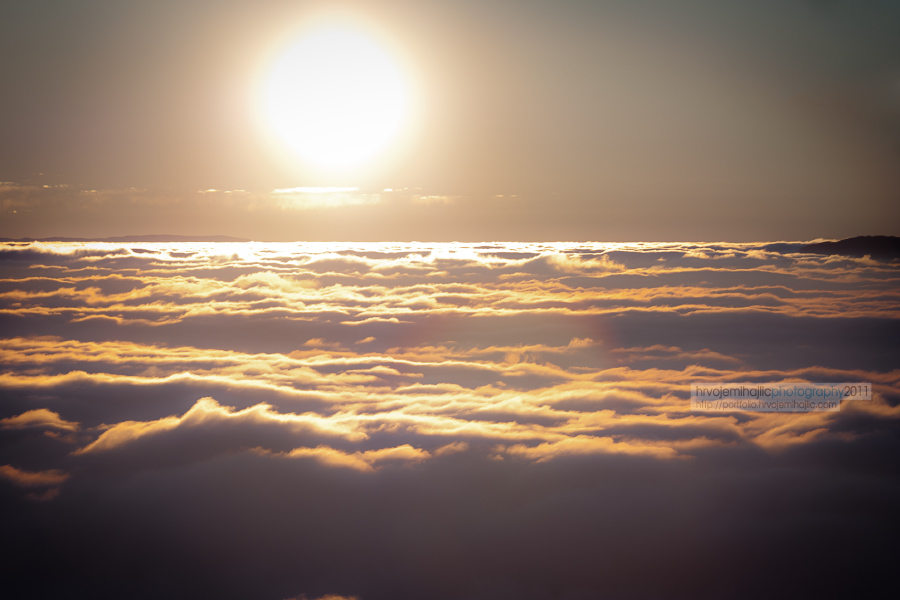 Shiny ball above the clouds