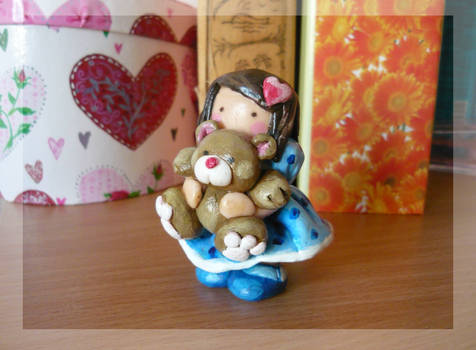 Girl and teddy bear