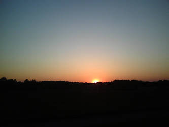 Sunset over soccer feild