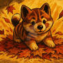 Akita Puppy playing with Leaves