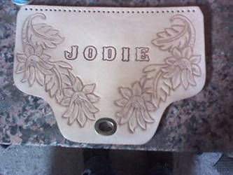 Tooled purse face