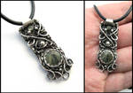 silver + green garnet necklace by annie-jewelry