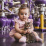 Portrait Of Baby Girl And Cat In Cadbury Chocolate