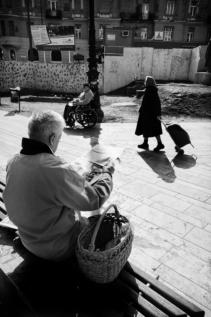 The beggar, the shopper and reading the news