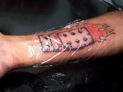 Cards on fire tattoo