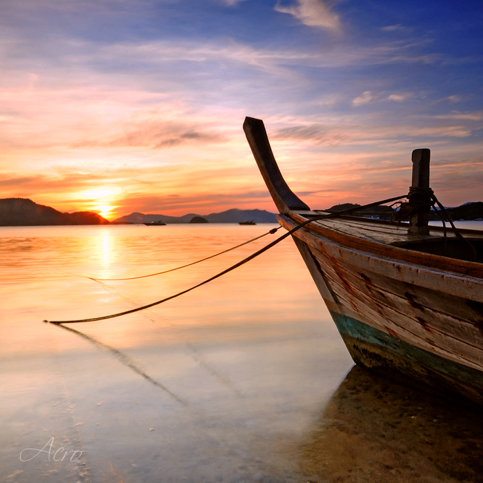 Long-tail boat and sunset