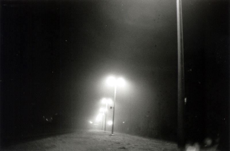 Foggy night at train station