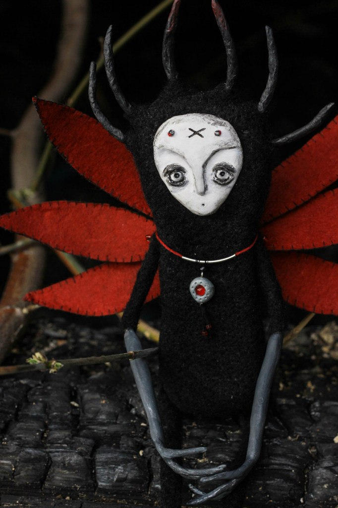 Dark strange fantasy spirit doll