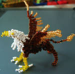 Bead gryphon by Niicchan
