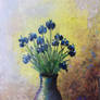 Miniature with a blue flowers