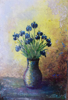 Miniature with a blue flowers