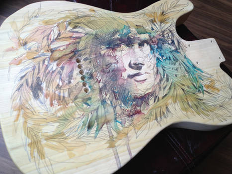 Work in progress on wooden guitar