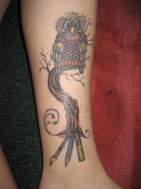 owl in tree tattoo