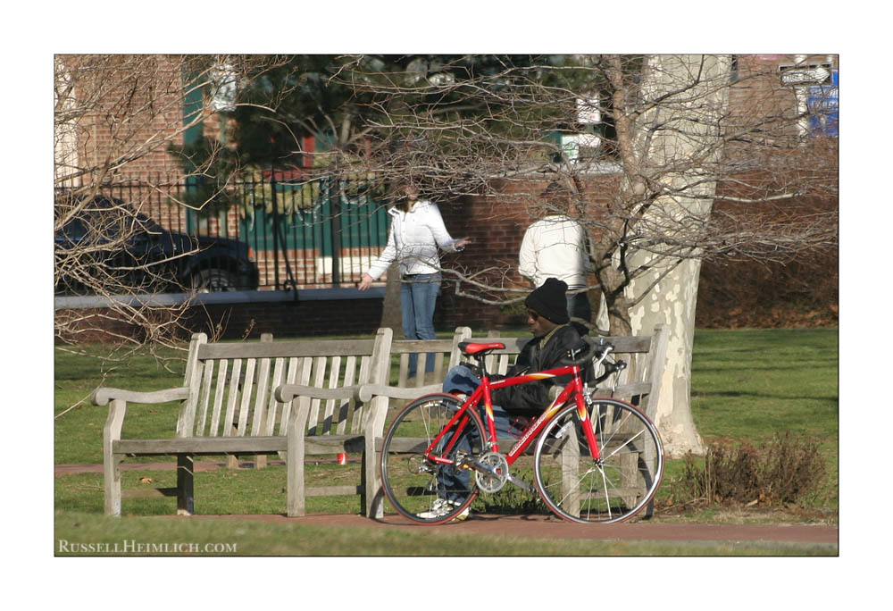 Man with red Bicycle