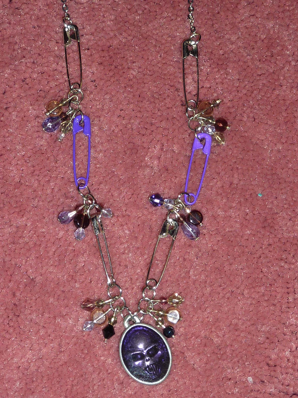 Purple skull safety pins
