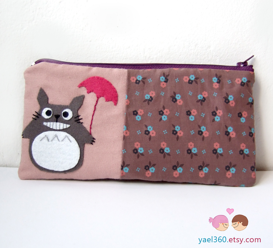 Totoro smiling with umbrella pouch