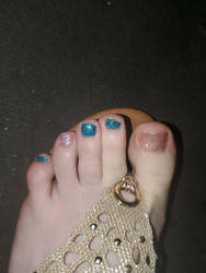 Toenails done for transgender pride.