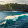 A wave among cliffs