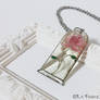 Art Nouveau pink rose under glass pendant