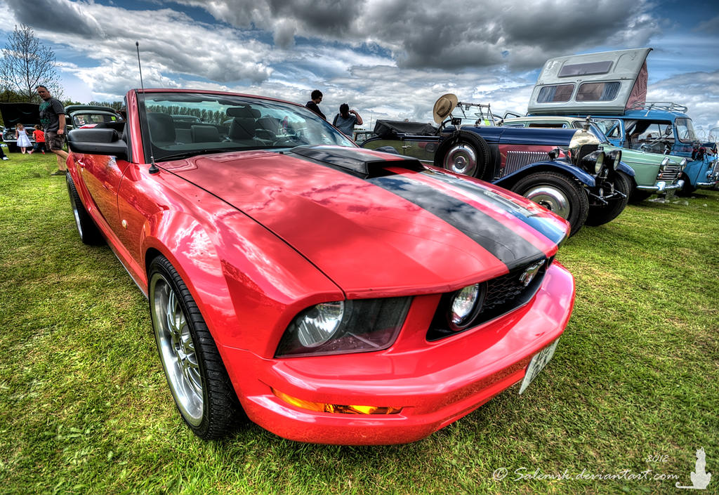 Shiny red Mustang...