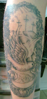 dove tattoo with vines, etc.