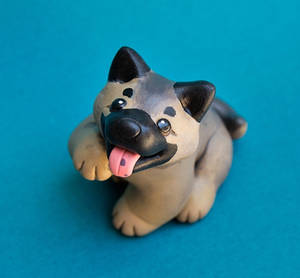 Eurasier puppy dog sculpture