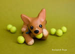 Astrid with tennis balls dog sculpture by SculptedPups