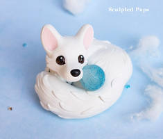 Arctic Fox with an Ice Sphere