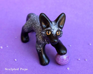 A Silver Fox with a Sphere of Magic