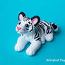 White tiger cub sculpture