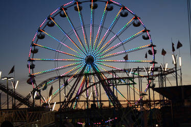 Ferris Wheel Against The Night