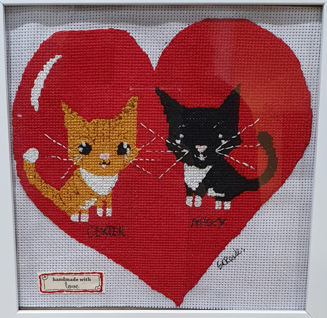 Cat cross stitch.