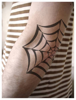 Superimposed tattoo elbow webb