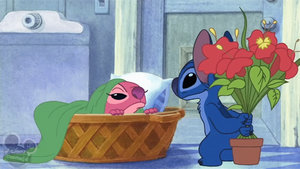 Stitch gives flowers to Angel GIF