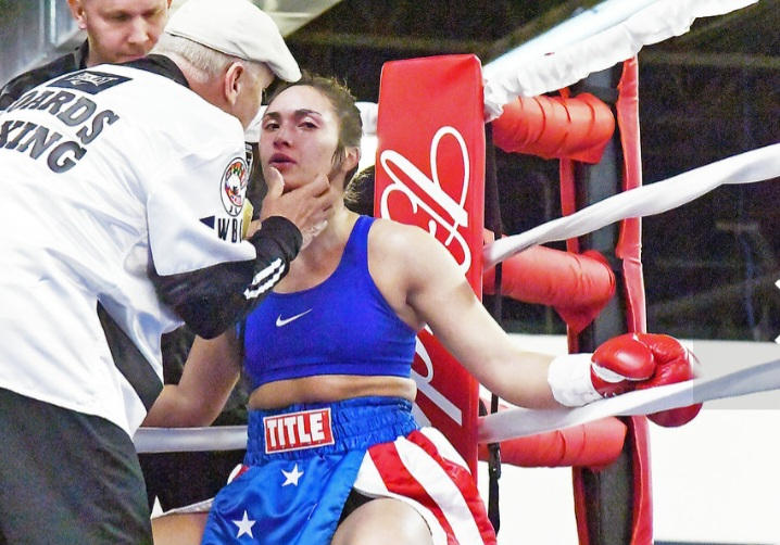 In the corner resting up her arms on the ropes by Renethom on DeviantArt