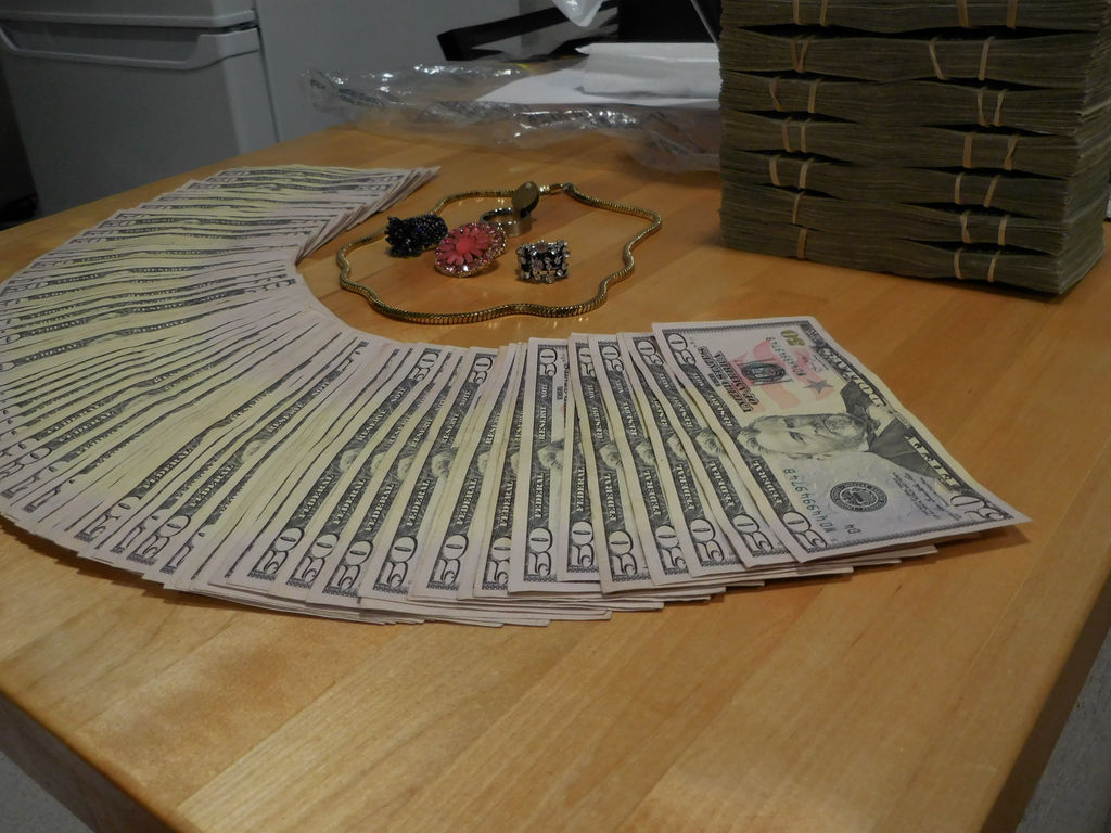 Thousandaire (5k of $50 plus stacks) by BlueAlaskan on DeviantArt